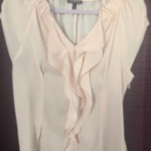 Express light peach ruffled blouse.